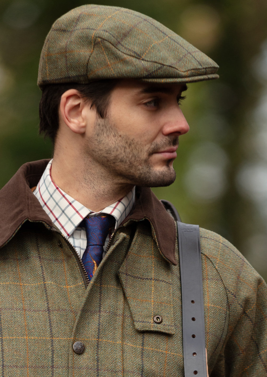 rutland-mens-tweed-flat-cap-dark-moss