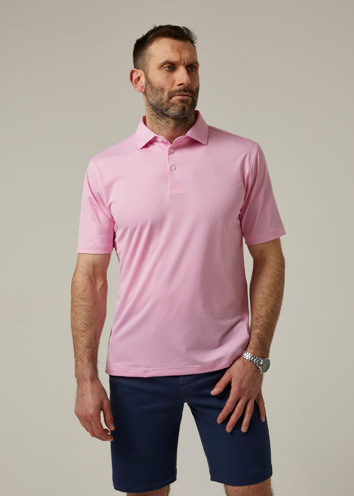 Striped short sleeved polo shirt in carnation pink