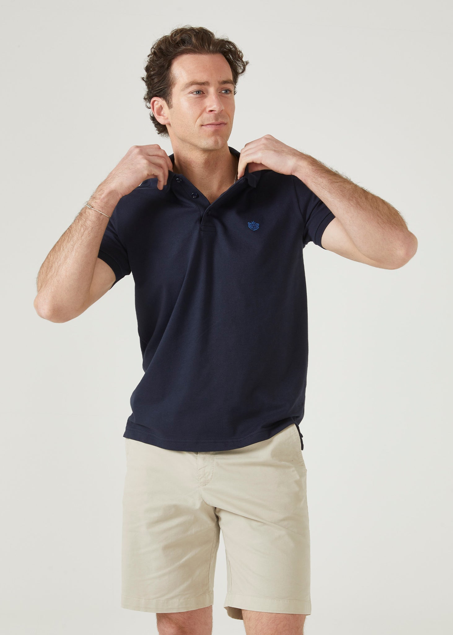 Pima cotton polo shirt in navy with AP emblem.