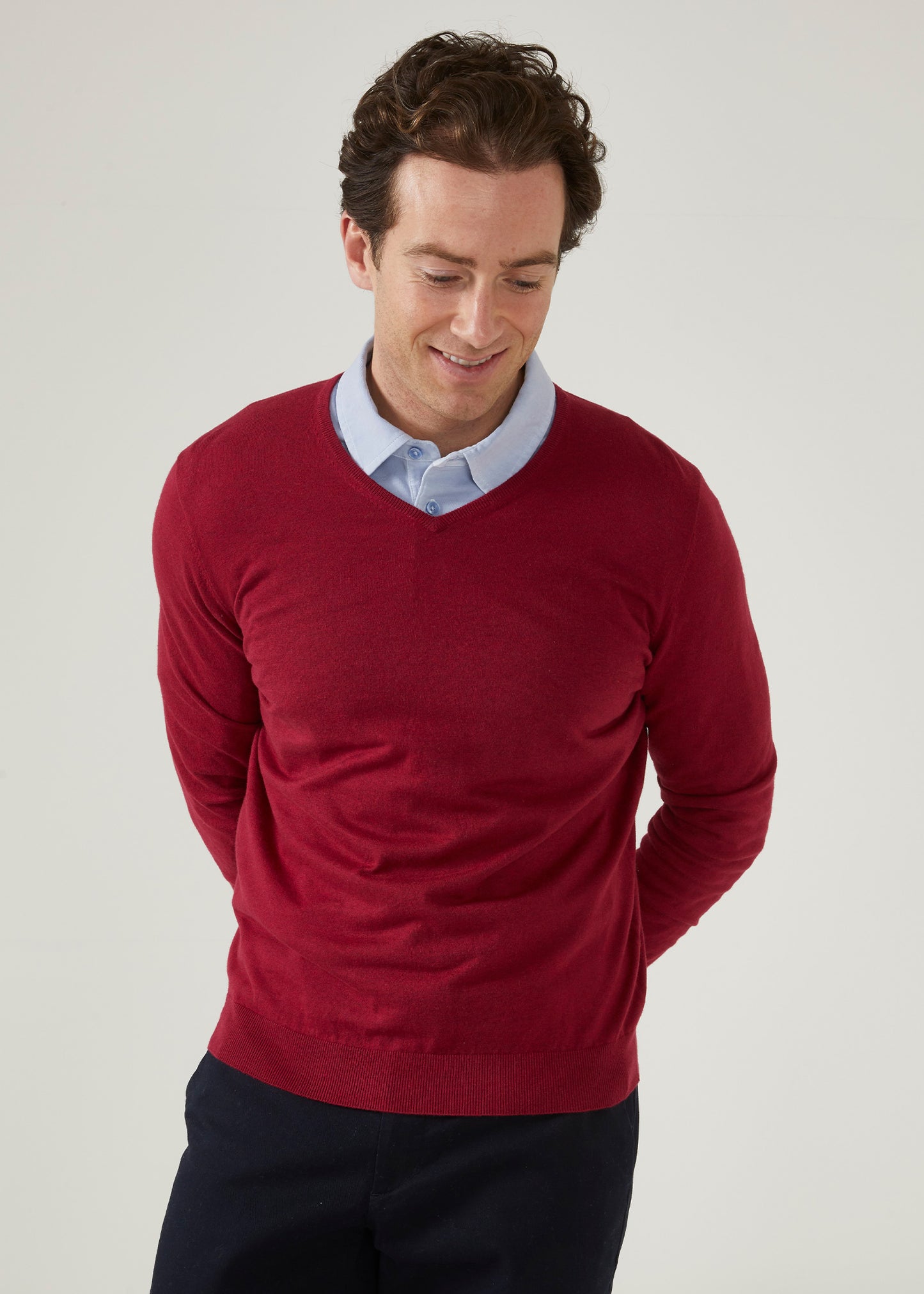 cotton cashmere jumper with a vee neck in claret red.