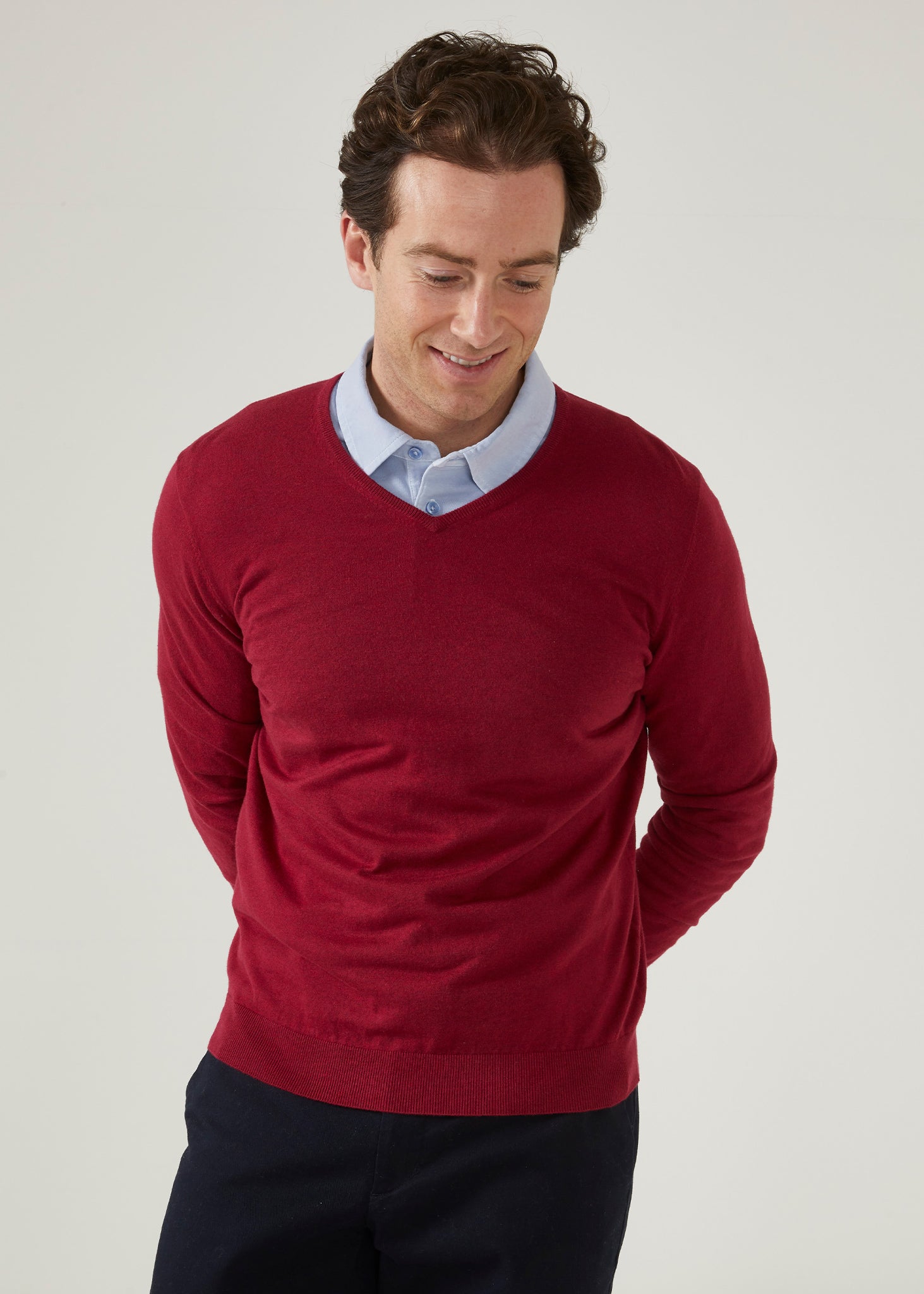 cotton cashmere jumper with a vee neck in claret red.